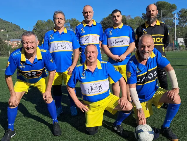 WABOL players together in blue and yellow shirts