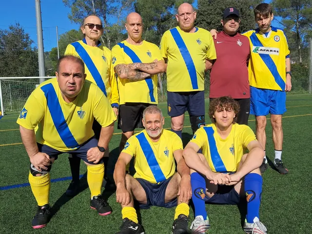 A WABOL team in yellow shirts with a blue stripe